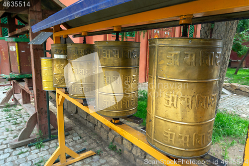 Image of Prayer wheels in buddhist monastery