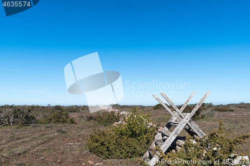 Image of Traditional wooden stile by an old dry stone wall