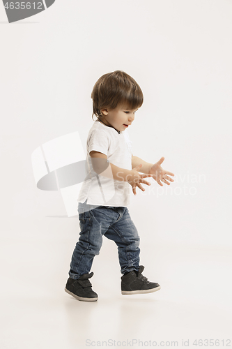 Image of Portrait of happy little boy over white background