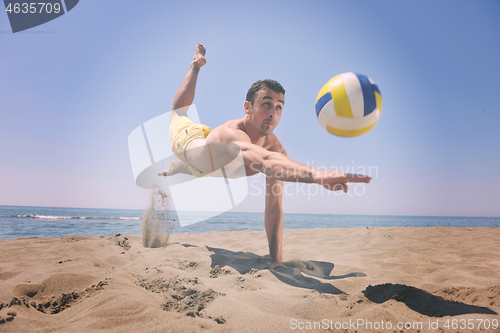 Image of male beach volleyball game player