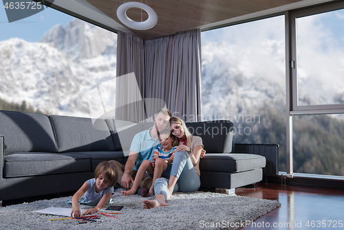 Image of young couple spending time with kids