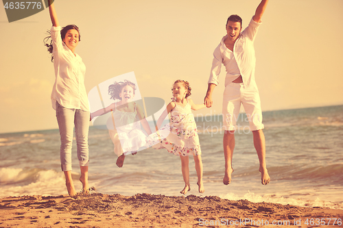 Image of happy young  family have fun on beach