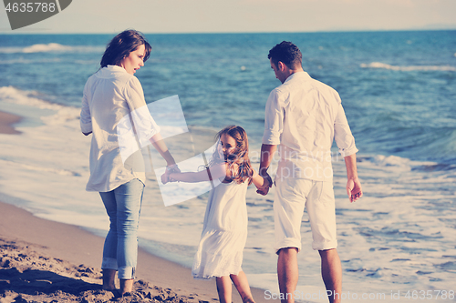 Image of happy young  family have fun on beach