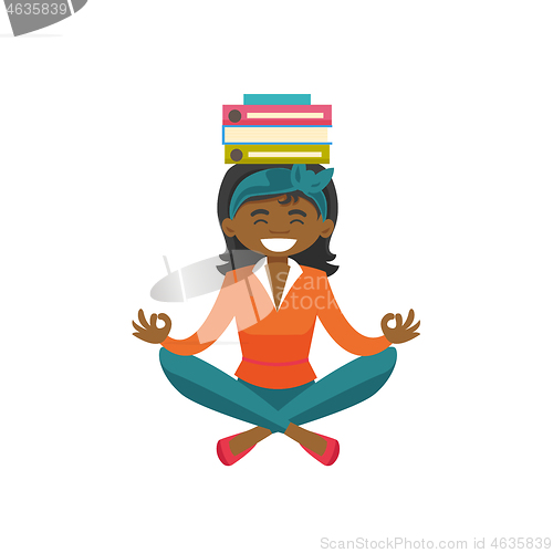 Image of Business woman meditating in lotus position.