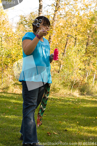 Image of Child Blowing Bubbles