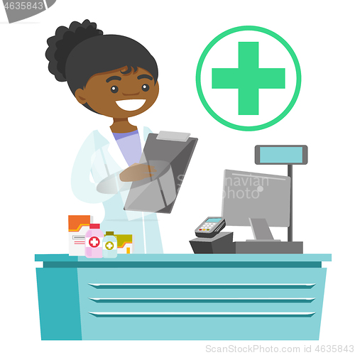 Image of African-american pharmacist writing prescription.