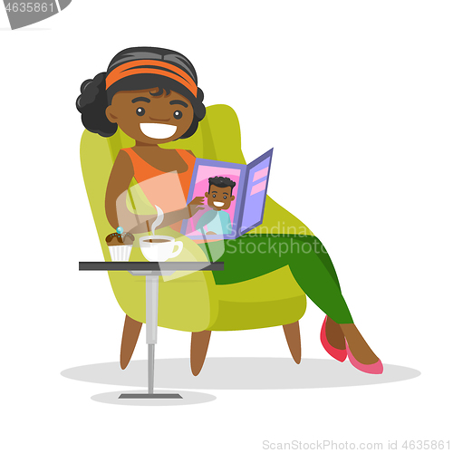 Image of Young african-american woman reading a magazine.