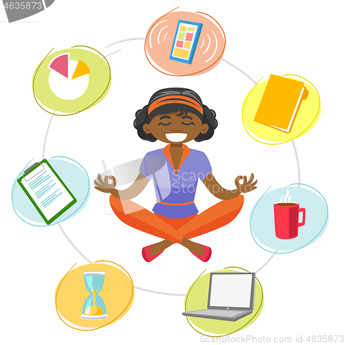 Image of Business woman meditating in yoga lotus position.