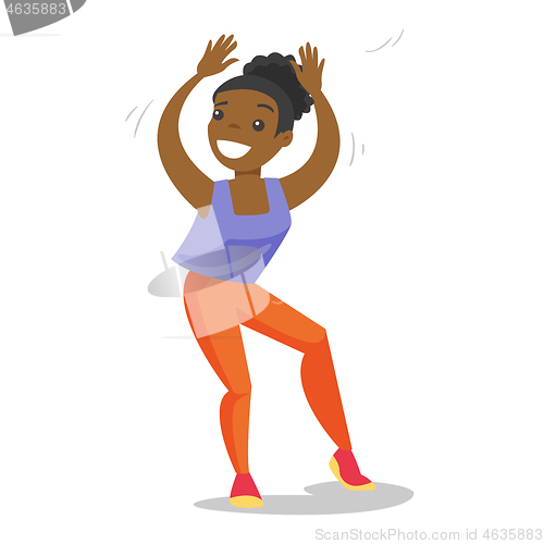 Image of Young african-american woman dancing.