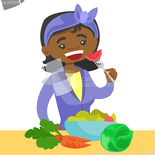Image of Young african woman eating healthy vegetable salad