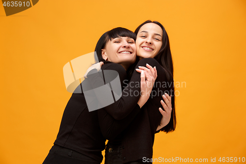 Image of A portrait of a happy mother and daughter