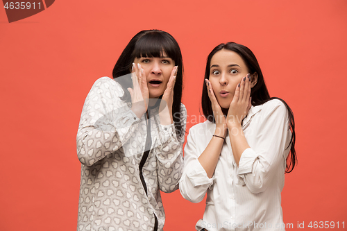 Image of A portrait of a surprised mother and daughter
