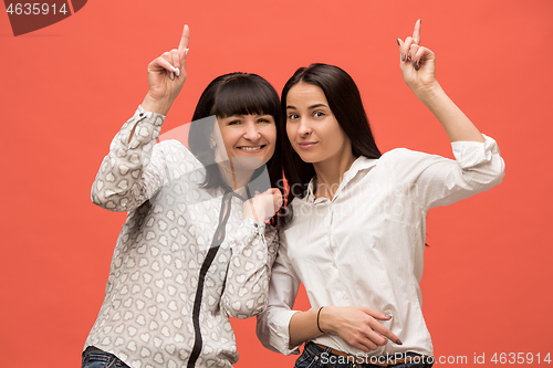 Image of A portrait of a surprised mother and daughter