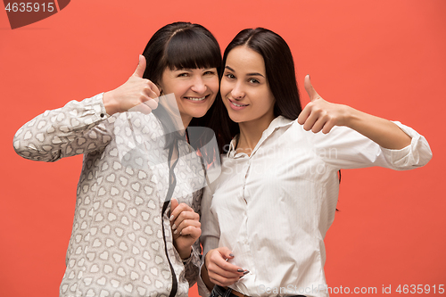 Image of A portrait of a happy mother and daughter