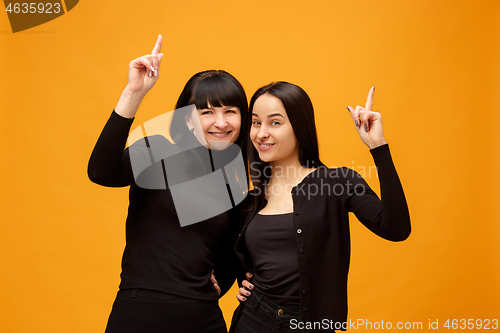 Image of A portrait of a happy mother and daughter