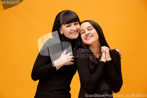 Image of A portrait of a happy mother and daughter