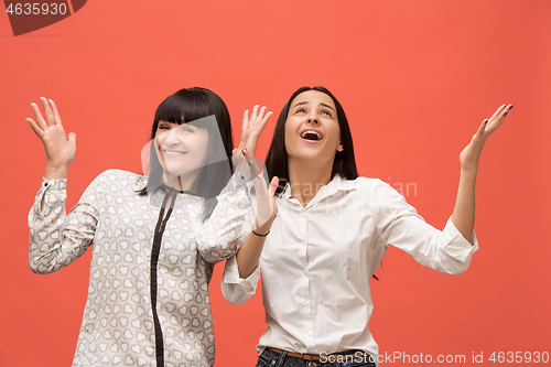 Image of A portrait of a surprised mother and daughter