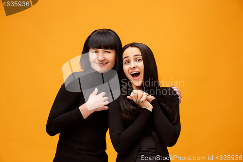 Image of A portrait of a happy mother and daughter