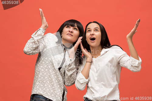 Image of A portrait of a surprised mother and daughter