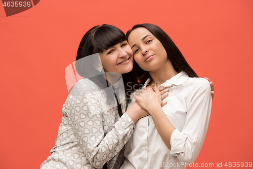 Image of A portrait of a happy mother and daughter