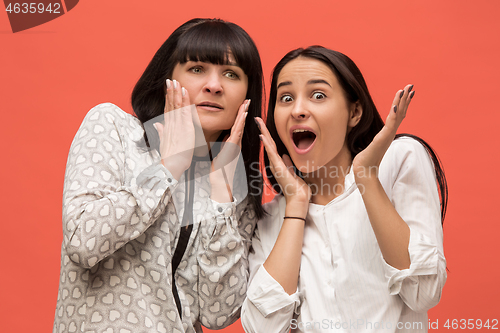 Image of A portrait of a surprised mother and daughter