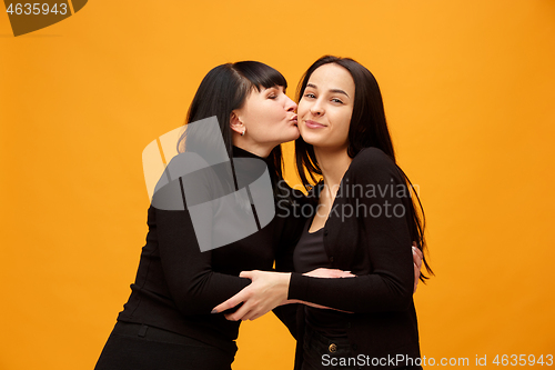 Image of A portrait of a happy mother and daughter