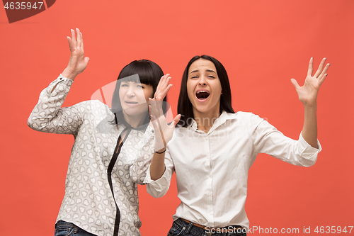 Image of A portrait of a surprised mother and daughter