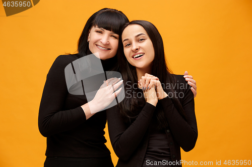 Image of A portrait of a happy mother and daughter