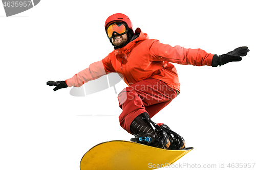 Image of Portrait of young man in sportswear with snowboard isolated on a white background.