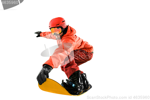 Image of Portrait of young man in sportswear with snowboard isolated on a white background.