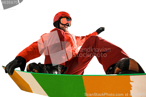 Image of Portrait of young man in sportswear with snowboard isolated on a white background.