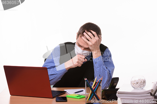 Image of Ill office worker coughing in the workplace