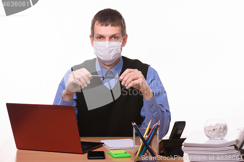 Image of Office worker in protective medical mask on a white background