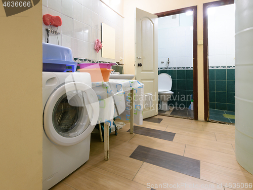 Image of Old washroom with separate toilet and bathroom