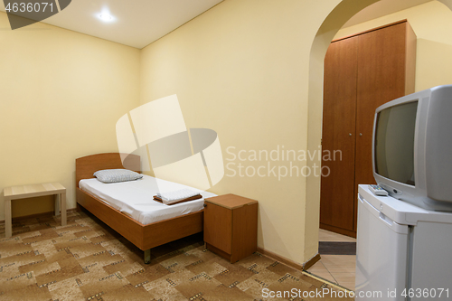 Image of The interior of a small budget hotel room