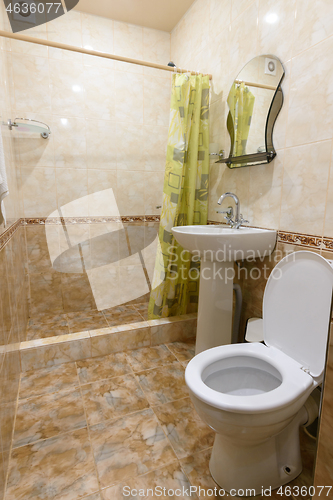 Image of Interior of a small bathroom combined with a bathroom in a guest house