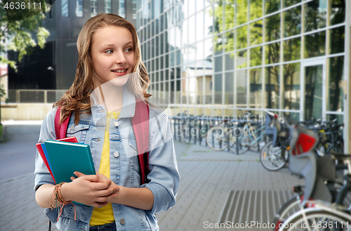 Image of happy smiling teenage student girl with school bag