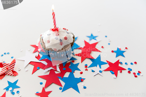 Image of cupcake with candle and stars at 4th july party