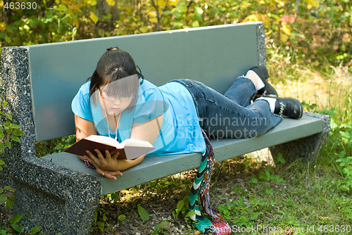 Image of Girl Reading Outside