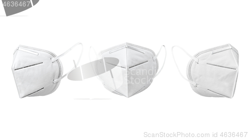 Image of Set from medical face masks floating against white background.