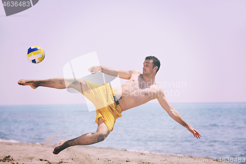 Image of male beach volleyball game player