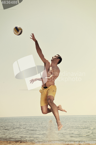 Image of male beach volleyball game player