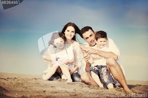 Image of happy young family have fun on beach