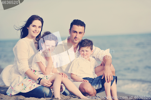 Image of happy young family have fun on beach