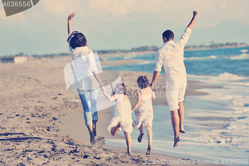 Image of happy young  family have fun on beach
