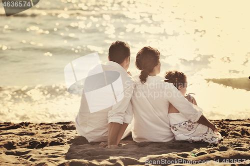 Image of happy young  family have fun on beach