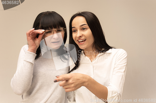 Image of A portrait of a happy mother and daughter