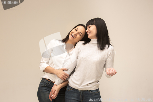 Image of A portrait of a happy mother and daughter