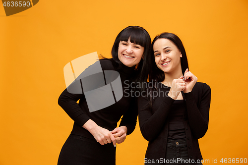 Image of A portrait of a happy mother and daughter