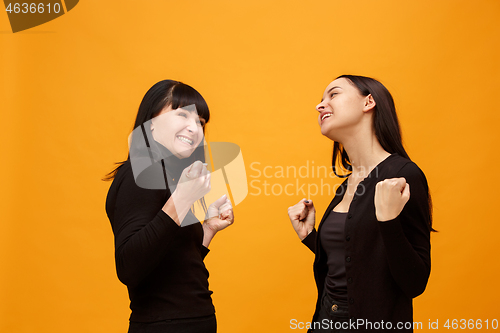 Image of A portrait of a happy mother and daughter